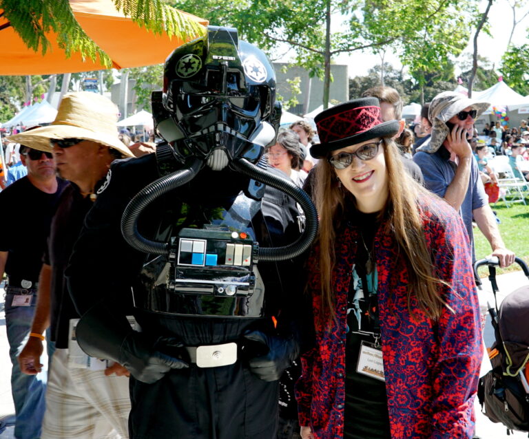 2018 O.C. Children's Book Festival - Horror Author Lori R. Lopez Posing With Star Wars Cosplay Fighter Pilot